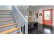 Clean, modern staircase with light wood and white railing at 6442 Mourning Dove Dr # 6442, Bradenton, FL 34210