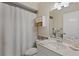 Simple bathroom with shower/tub combo and vanity at 6824 Jarvis Rd, Sarasota, FL 34241