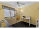 Bright bedroom with sewing machine and lots of storage at 6824 Jarvis Rd, Sarasota, FL 34241