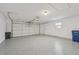 Attached garage with epoxy flooring and ample space at 7157 Fairway Bend Cir, Sarasota, FL 34243