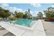 Refreshing community pool with surrounding lounge chairs at 7157 Fairway Bend Cir, Sarasota, FL 34243