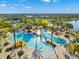 Expansive pool area with various features and lush landscaping at 7409 Chester Trl, Bradenton, FL 34202