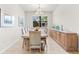 Elegant dining room with large table and hardwood floors at 7409 Chester Trl, Bradenton, FL 34202