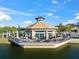 Community clubhouse sits on the lake at 7409 Chester Trl, Bradenton, FL 34202