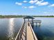 Wooden dock and gazebo on a peaceful lake at 7409 Chester Trl, Bradenton, FL 34202