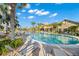 Relaxing pool with plenty of lounge chairs and a clubhouse view at 7409 Chester Trl, Bradenton, FL 34202