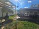 Backyard patio with a pergola and grill at 7561 120Th Ave, Largo, FL 33773