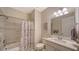 Bathroom with shower/tub combo and updated vanity at 7590 Summerland Cv, Bradenton, FL 34202