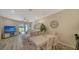 Bright dining room with table and chairs near the kitchen at 7590 Summerland Cv, Bradenton, FL 34202