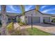 Attractive exterior of a two-story house with a gray double garage and landscaped walkway at 7590 Summerland Cv, Bradenton, FL 34202