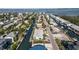 Aerial view of waterfront homes and canal at 765 Saint Judes N Dr, Longboat Key, FL 34228