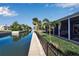 Stunning canal views from the backyard of this waterfront home at 765 Saint Judes N Dr, Longboat Key, FL 34228