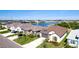 Aerial view of home near a lake in a quiet neighborhood at 8219 Abalone Loop, Parrish, FL 34219