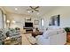 Bright and airy living room with ample natural light and comfortable seating at 8219 Abalone Loop, Parrish, FL 34219