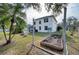 Spacious backyard with garden and string lights at 8260 47Th Street E Cir, Palmetto, FL 34221