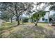 Large backyard with playset, garden, and plenty of green space at 8260 47Th Street E Cir, Palmetto, FL 34221