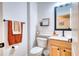 Clean bathroom with light wood vanity and toilet at 8260 47Th Street E Cir, Palmetto, FL 34221