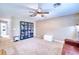 Bright bonus room with built-in bookcase and sitting area at 8260 47Th Street E Cir, Palmetto, FL 34221