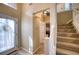 Bright entryway with staircase and view of hallway at 8260 47Th Street E Cir, Palmetto, FL 34221