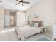 Spacious bedroom with neutral decor and plenty of natural light at 8624 Woodbriar Dr, Sarasota, FL 34238