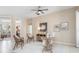 Bright and airy living area with neutral tones and access to other rooms at 8624 Woodbriar Dr, Sarasota, FL 34238