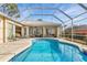 Relaxing screened pool and patio with access to house at 8624 Woodbriar Dr, Sarasota, FL 34238