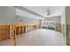 Open living room featuring tile flooring, an open space, and sliding glass doors leading outside at 866 N Shore Dr, Anna Maria, FL 34216