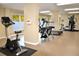 Well-equipped fitness center with cardio and weight machines at 9397 Midnight Pass Rd # 603, Sarasota, FL 34242