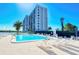 Enjoy this beautiful outdoor pool with waterfront views at 9397 Midnight Pass Rd # 603, Sarasota, FL 34242