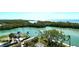 Amazing water views of the bay and canal from this waterfront property nestled in lush landscaping at 9397 Midnight Pass Rd # 603, Sarasota, FL 34242