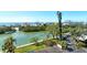 Enjoy the waterfront views surrounded by lush landscape, and the calming sounds of nature at 9397 Midnight Pass Rd # 603, Sarasota, FL 34242