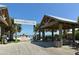 Anna Maria City Pier entrance with people walking towards the water at 111 9Th N St, Bradenton Beach, FL 34217