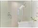 Walk-in shower with glass enclosure and modern fixtures at 115 Los Cedros Dr, Anna Maria, FL 34216