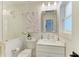 Bathroom with glass shower, white tile, and modern vanity at 115 Los Cedros Dr, Anna Maria, FL 34216