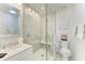Clean bathroom with walk-in shower and modern vanity at 115 Los Cedros Dr, Anna Maria, FL 34216