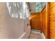 Private outdoor shower with wooden privacy screen at 115 Los Cedros Dr, Anna Maria, FL 34216
