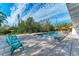 Inviting pool and patio area with lounge chairs at 115 Los Cedros Dr, Anna Maria, FL 34216