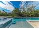 Stunning pool with a spa, perfect for relaxation and entertaining at 115 Los Cedros Dr, Anna Maria, FL 34216