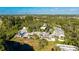 Complex of condo buildings near a lake at 123 Pinehurst Dr, Bradenton, FL 34210