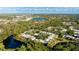 Complex of condo buildings near a lake at 123 Pinehurst Dr, Bradenton, FL 34210