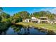Property showcasing the home's private backyard and canal view at 123 Pinehurst Dr, Bradenton, FL 34210