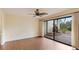Bedroom with patio access and ceiling fan at 123 Pinehurst Dr, Bradenton, FL 34210