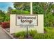 Welcoming entrance sign for Wildwood Springs on Oakview Drive at 123 Pinehurst Dr, Bradenton, FL 34210