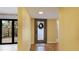 Bright entryway with wood flooring and frosted glass door at 123 Pinehurst Dr, Bradenton, FL 34210