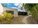 Home exterior showcasing a screened patio at 123 Pinehurst Dr, Bradenton, FL 34210