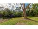 Peaceful waterfront view with lush vegetation at 123 Pinehurst Dr, Bradenton, FL 34210