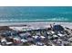 Aerial view of the charming beach house, near the sandy beach and turquoise ocean at 126/128 Avenida Veneccia, Sarasota, FL 34242