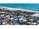 Gorgeous aerial view showcasing the house close to the beach, set in a beautiful neighborhood landscape at 126/128 Avenida Veneccia, Sarasota, FL 34242