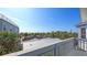 Scenic balcony offering tropical views and inviting ambiance at 126/128 Avenida Veneccia, Sarasota, FL 34242