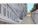Charming home exterior featuring a staircase and wooden details at 126/128 Avenida Veneccia, Sarasota, FL 34242